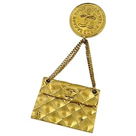 Broche Chanel banhada a ouro Dourado