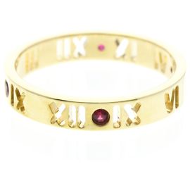 Autre Marque Bague Tiffany Atlas ajourée en or jaune avec rubis Doré