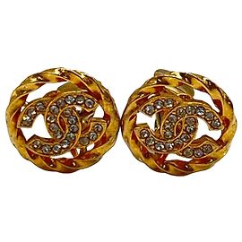 Boucles d'oreilles clips rondes Chanel Gold CC plaquées or avec strass Doré