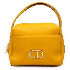 Bolsa Dior em couro amarelo com logo CD Amarelo Mostarda