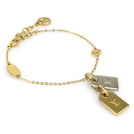 Pulsera con dijes Louis Vuitton Plata Dorado
