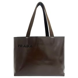 Borsa Tote in pelle Prada con logo traforato Marrone
