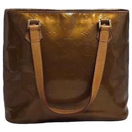 Magnífico bolso Louis Vuitton Dorado