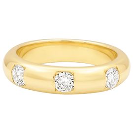 Autre Marque Yellow gold hoop ring with three bezel-set diamonds. Other