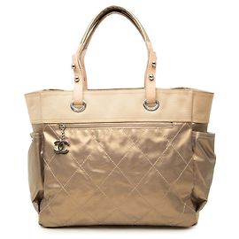 Sac cabas Chanel Paris Biarritz Large en toile enduite matelassée Gold Doré