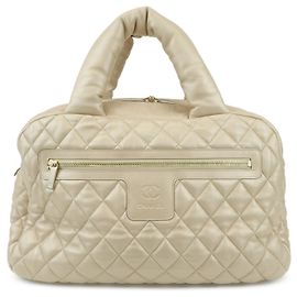 Chanel Coco Cocoon Bowling Quilted Lambskin Medium Dourado