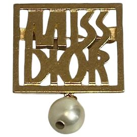 Spilla Dior Miss Dior dorata D'oro