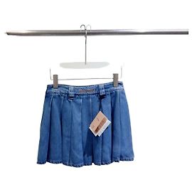 Saia Miu Miu em denim azul com logótipo bordado a dourado Outro