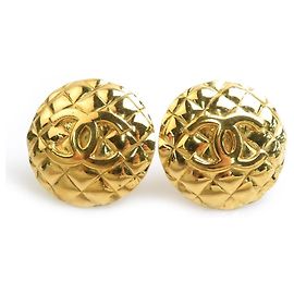 Boucles d'oreilles clips Chanel en métal doré Doré