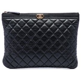 Chanel Black Medium Quilted Caviar Boy O Case Clutch Negro