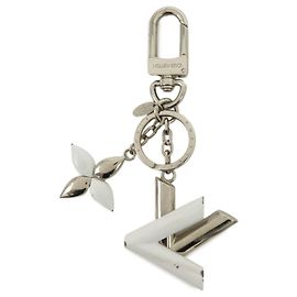 Louis Vuitton Twist Chaveiro e Acessório de Bolsa em Metal Silver White M68010 Prata Branco