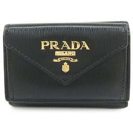 Portafoglio compatto triplis PRADA Vitello Move in pelle Nero 1MH021 Nero