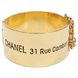 Brazalete de metal dorado Chanel Dorado
