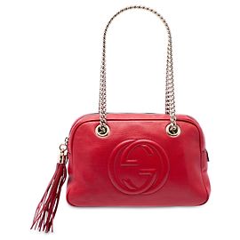 Borsa a tracolla Gucci Soho con catena e zip in pelle di vitello rossa Rosso