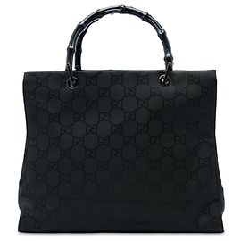Bolsa Gucci em nylon GG preto com bambu Preto