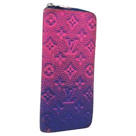 LOUIS VUITTON Taurillon Clemence Illusion Zippy Wallet Vertical Outro