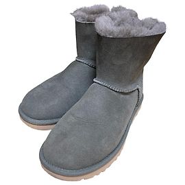 Botas de pele de carneiro UGG Mini Bailey Bow II Marrom