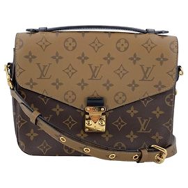 Louis Vuitton Bolsa de Ombro Metis Monogram Reverse em Lona Castanha e Bege Marrom