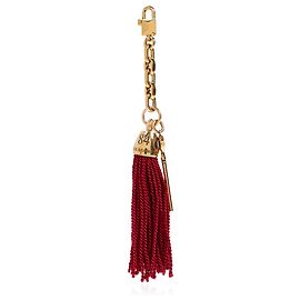 Charm para bolsa Dolce & Gabbana dourado com chave e borla vermelha Dourado Metálico