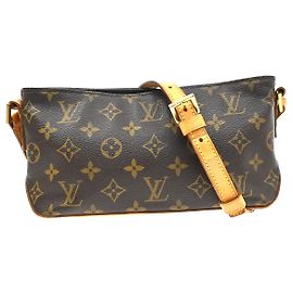 Louis Vuitton Trotteur Monogram Canvas Marrom