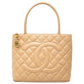 mala Chanel Caviar Medallion Bege Bege