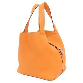 Hermès Bolso Hermes Picotin Lock MM Taurillon Clemence Naranja