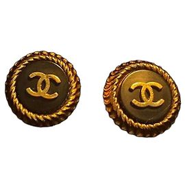 Pendientes de clip CHANEL Button resina negra y oro Negro Dorado