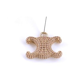 Pingente Céline dourado com strass Dourado