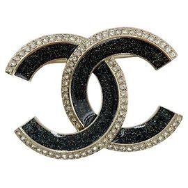 Broche Chanel Coco Mark Negro Dorado