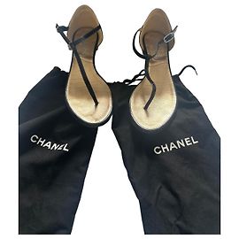 Chanel flat sandals in black and gold leather Black Golden