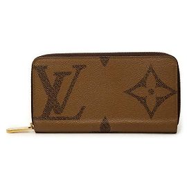 Cartera Zippy Louis Vuitton Monogram Giant Reverse Castaño