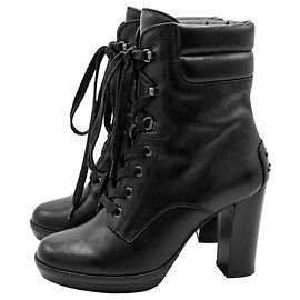Tod's Botins de couro preto com salto Preto
