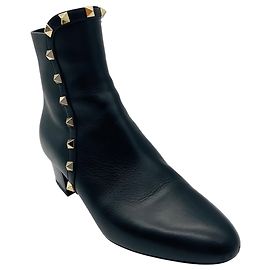 Valentino Garavani Botines Valentino de piel Rockstud Negro / Dorado Negro