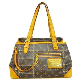 mala Louis Vuitton Monogram Rivet Marrom