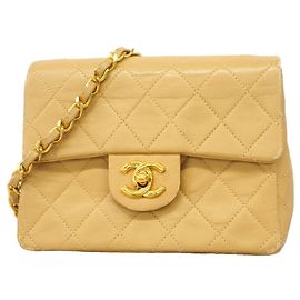 Bolsa de Ombro Mini Matelassé com Corrente Chanel Bege