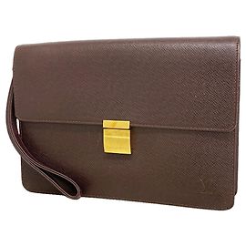 Borsa pochette Louis Vuitton Taiga Selenga Marrone
