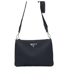 Prada Borsa a tracolla pouch in nylon con logo triangolare Marrone