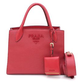 Prada  mala Tote e mala de ombro monocromática em Saffiano vermelha Vermelho