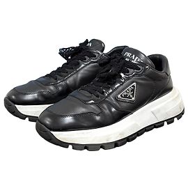 Prada Zapatillas de cuero para mujer con logotipo triangular Blanco