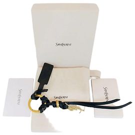 Autre Marque Chaveiro Cassandre em couro dourado Preto