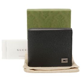Gucci Cartera bifold Castaño