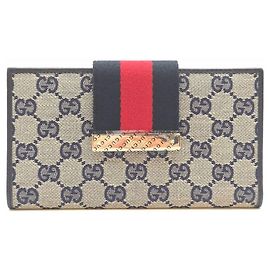 Gucci Carteira longa com aba em lona Marrom