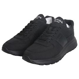 Prada Baskets en cuir et nylon noir Noir