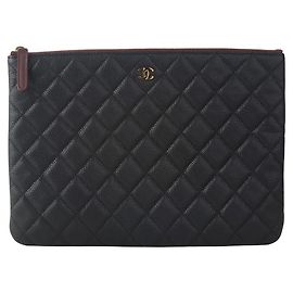 Chanel Caviar Clutch Gold New Medium Black