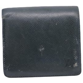 Portefeuille bi-fold Louis Vuitton en cuir vert Vert
