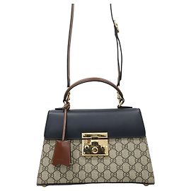 Gucci Borsa a mano e a tracolla Supreme Padlock GG Supreme Top Handle Marrone