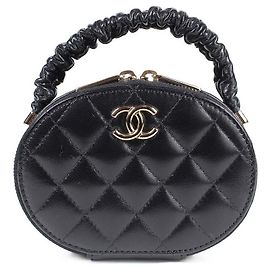 Chanel Vanity Case Rond en Cuir Matelassé Noir Noir
