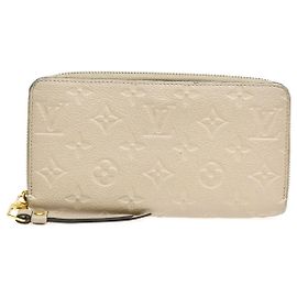 Louis Vuitton Zippy Monogram Empreinte Leather 20 cm Beige