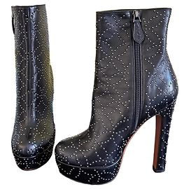 Alaïa Studded Leather Ankle Boots Black