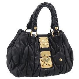 Borsa Convertible Coffer Miu Miu in Pelle Matelassé Medium Nero